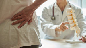 Man visiting a spine specialist for his chronic back pain.